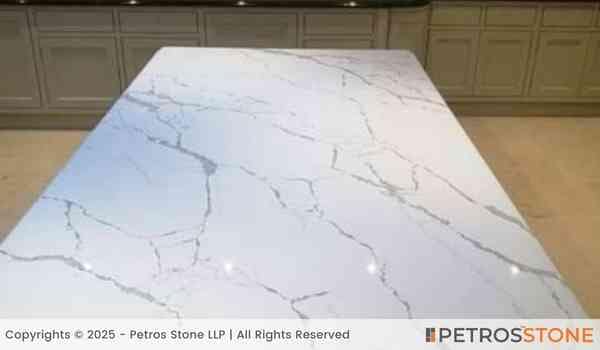 Calacatta Venato Quartz Stone Slab 4 https://mlqbefe4awri.i.optimole.com/cb:u0KH.819/w:auto/h:auto/q:mauto/f:best/http://quartz.petrosstone.com/wp-content/uploads/2025/03/Calacatta-Venato-Quartz-Countertop-2.jpg